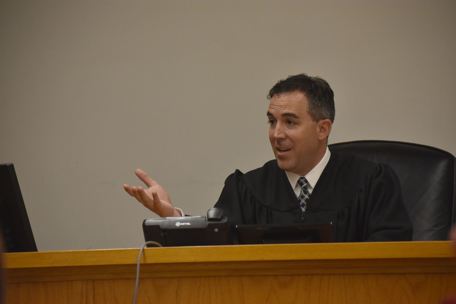 Judge Hendee congratulates Charles Leofilos
